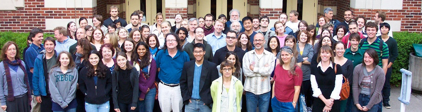 Members of the psychology department standing outside Straub Hall