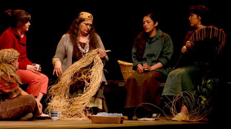 actors sit on stage