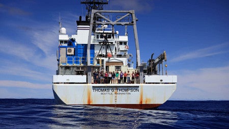The OIMB science team on a boat for recent research cruise to Tonga.
