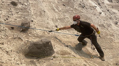 UO volcanologist Thomas Giachetti, who recently received an NSF CAREER Award, collects ash samples near Crater Lake. (Image: Anaïs Férot)