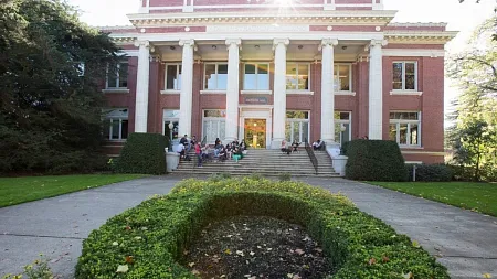 Students gathering on the front steps of Johnson Hall