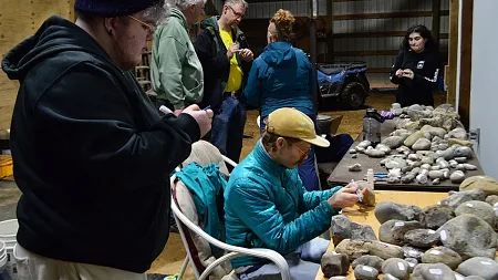 Students sort through fossils