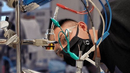 Person working in electrochemistry lab