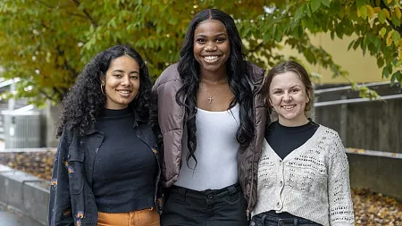 three women posing 