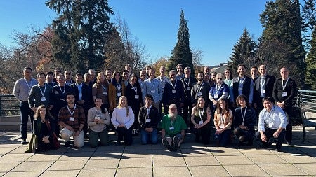 Group of people posing outside
