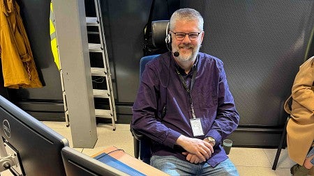 Eric Torrence at a desk