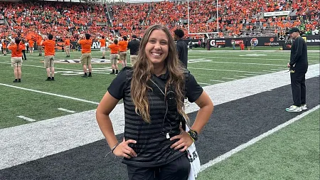 a person stands on a football field
