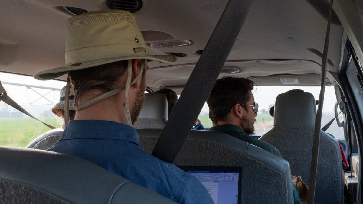 Student sitting in car