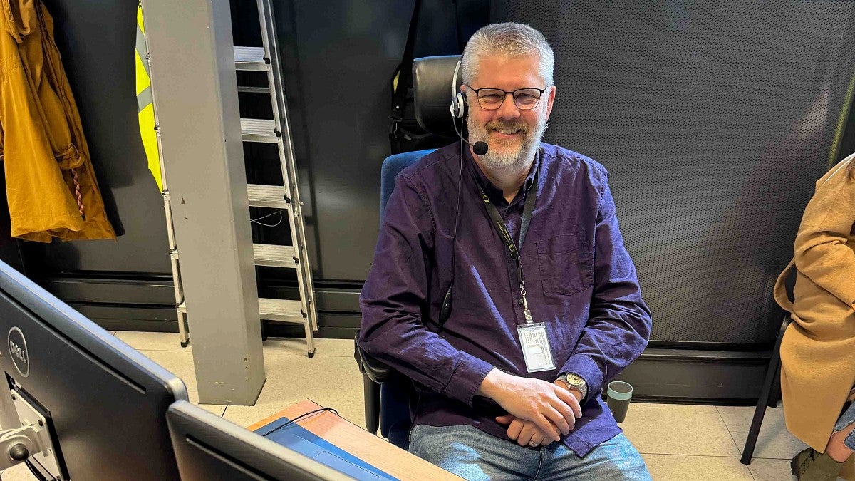 Eric Torrence at a desk