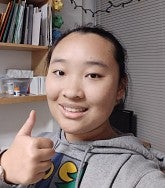 a person giving a "thumbs up" gesture