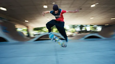 a person doing a skateboarding trick