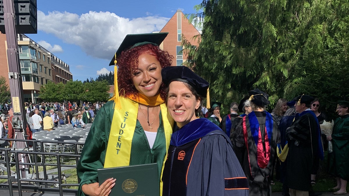 Psychology master's graduate Lexi Ellis with professor Sara Hodges